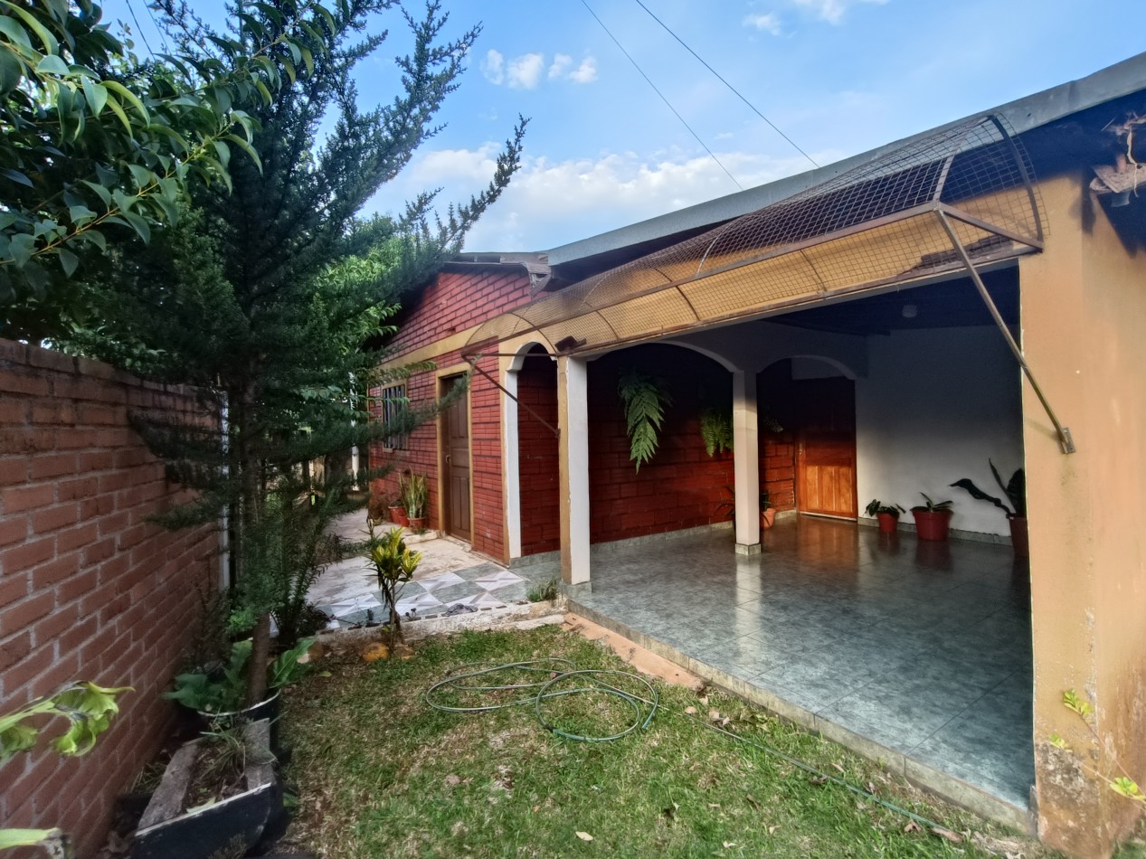 CASA CON TERRENO 