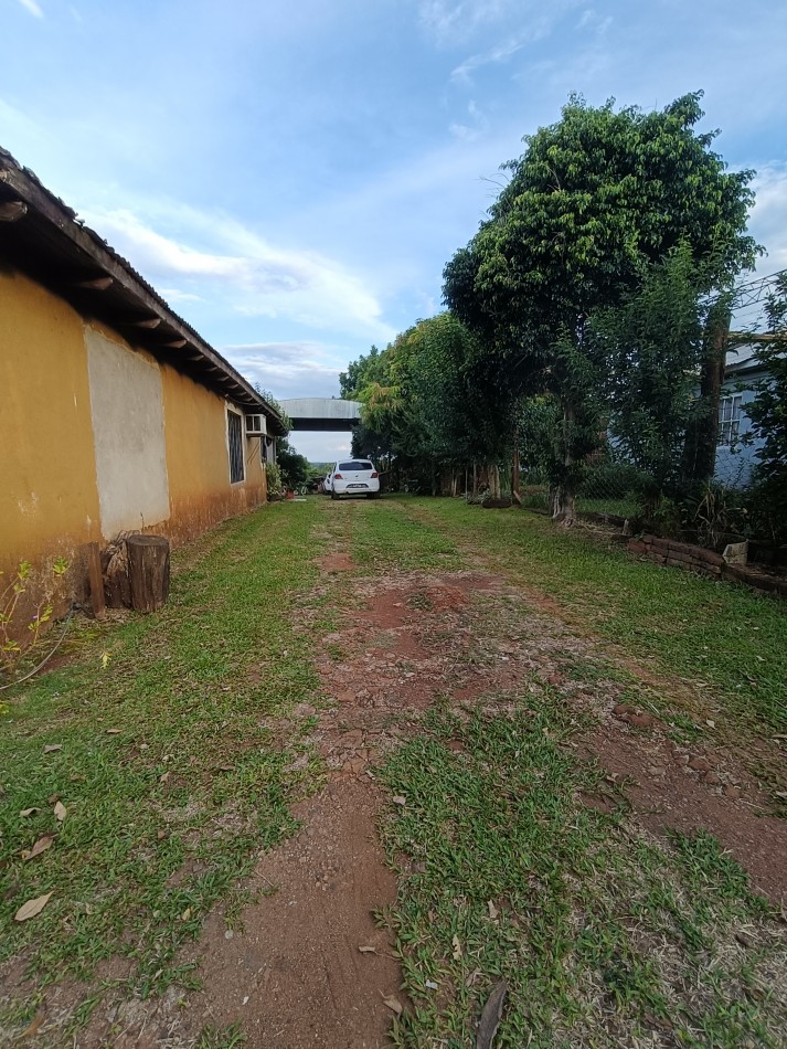 CASA CON TERRENO 