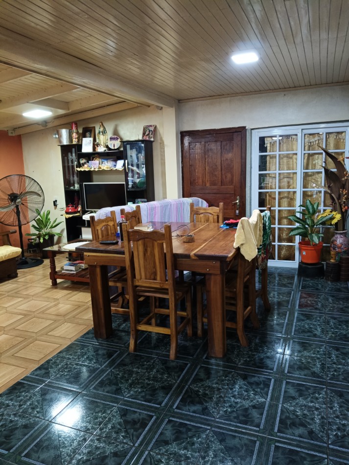 CASA CON TERRENO 
