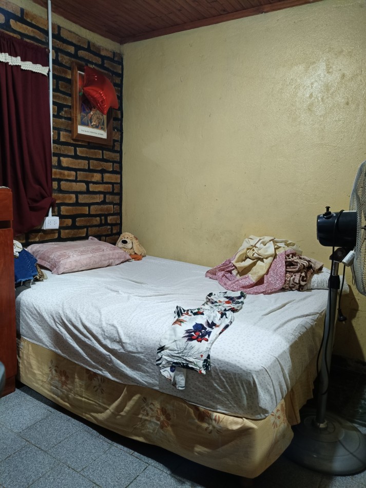 CASA CON TERRENO 