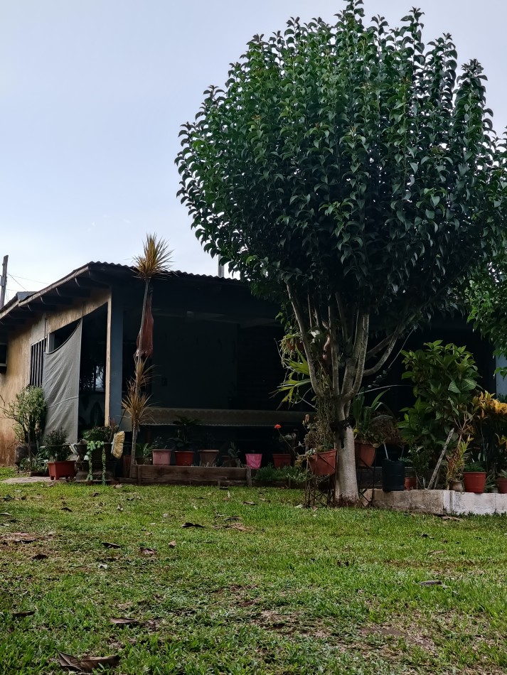 CASA CON TERRENO 