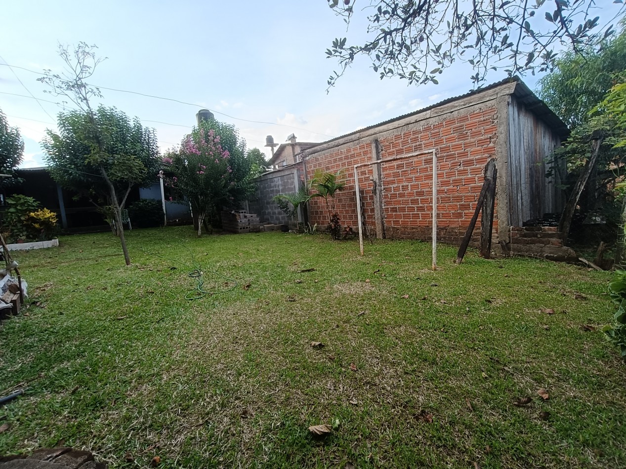 CASA CON TERRENO 