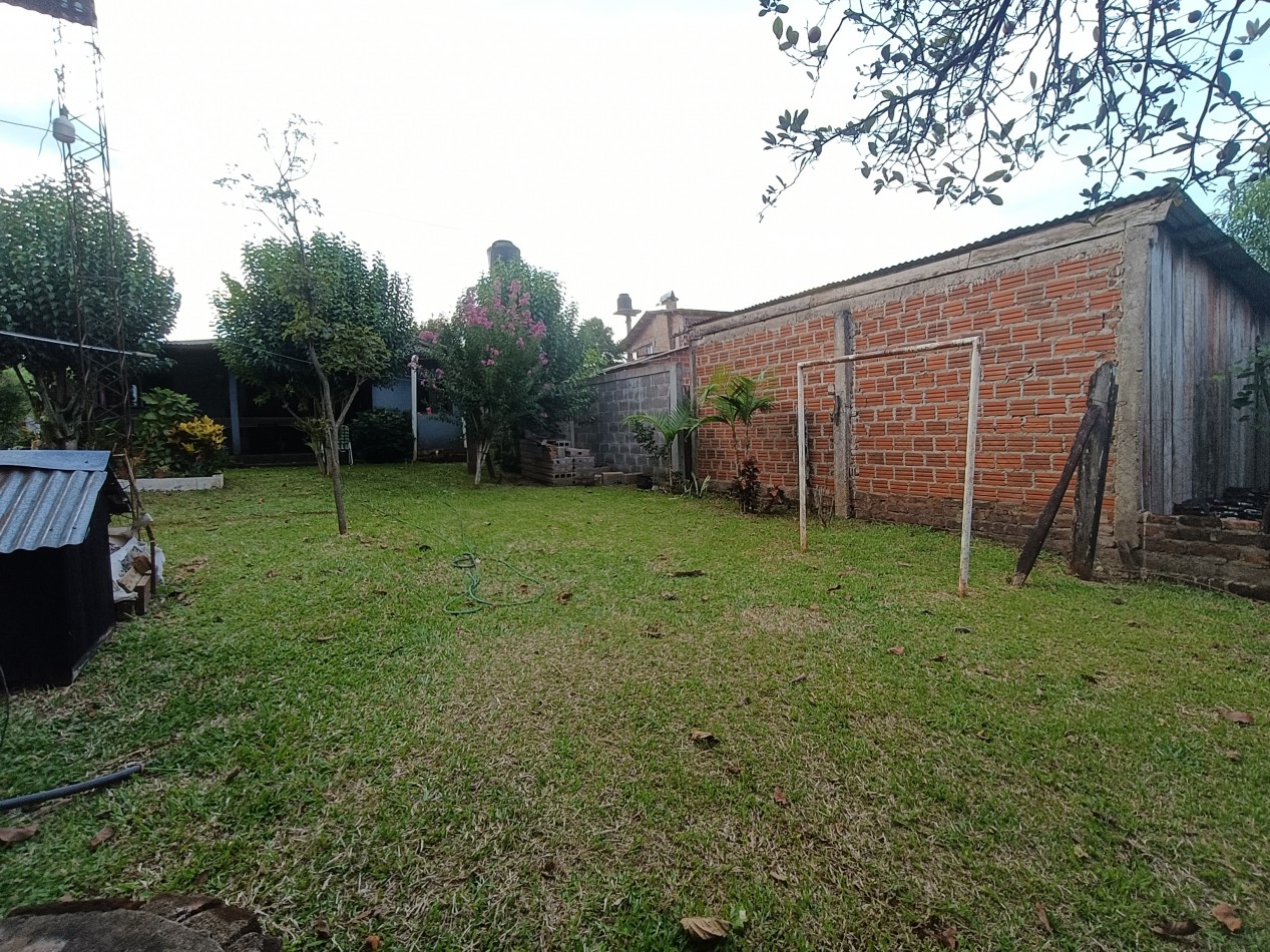CASA CON TERRENO 