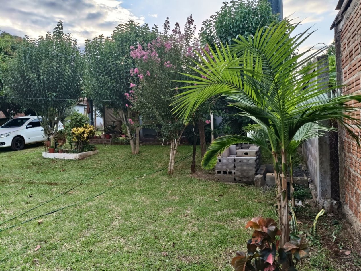 CASA CON TERRENO 