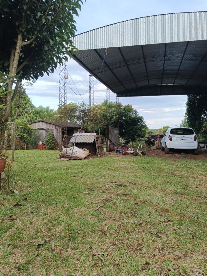 CASA CON TERRENO 