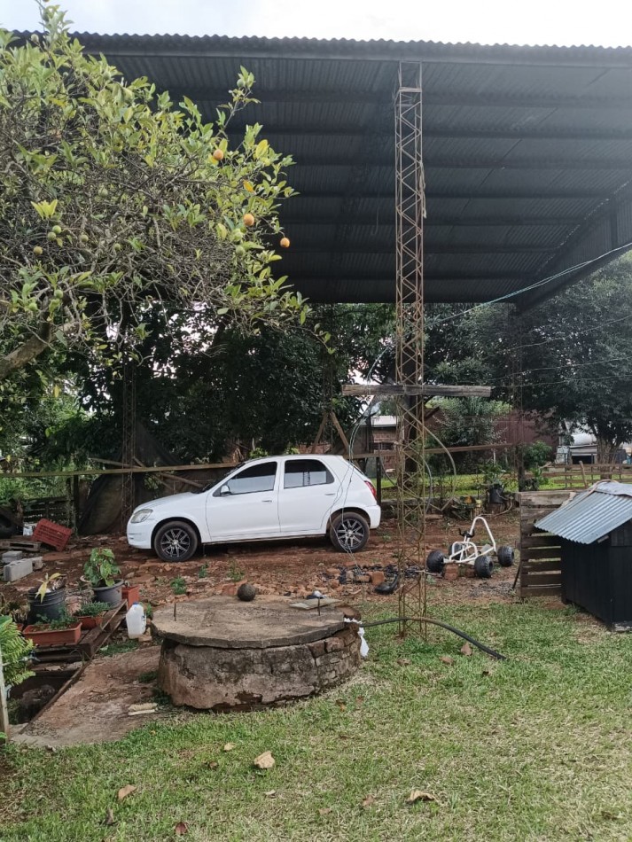 CASA CON TERRENO 