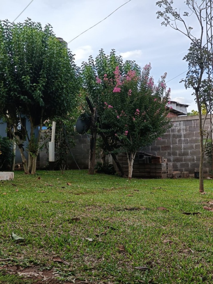 CASA CON TERRENO 