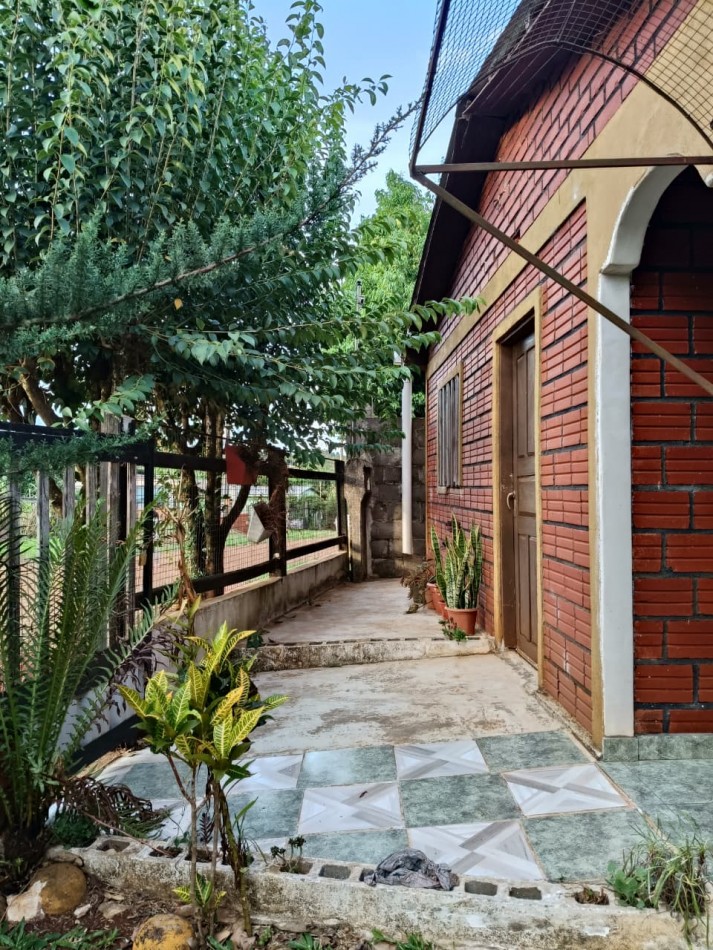 CASA CON TERRENO 