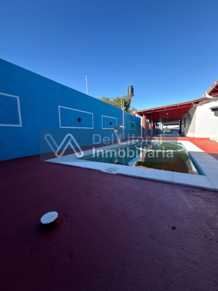 TERRENO CON CASA, QUINCHO Y PILETA