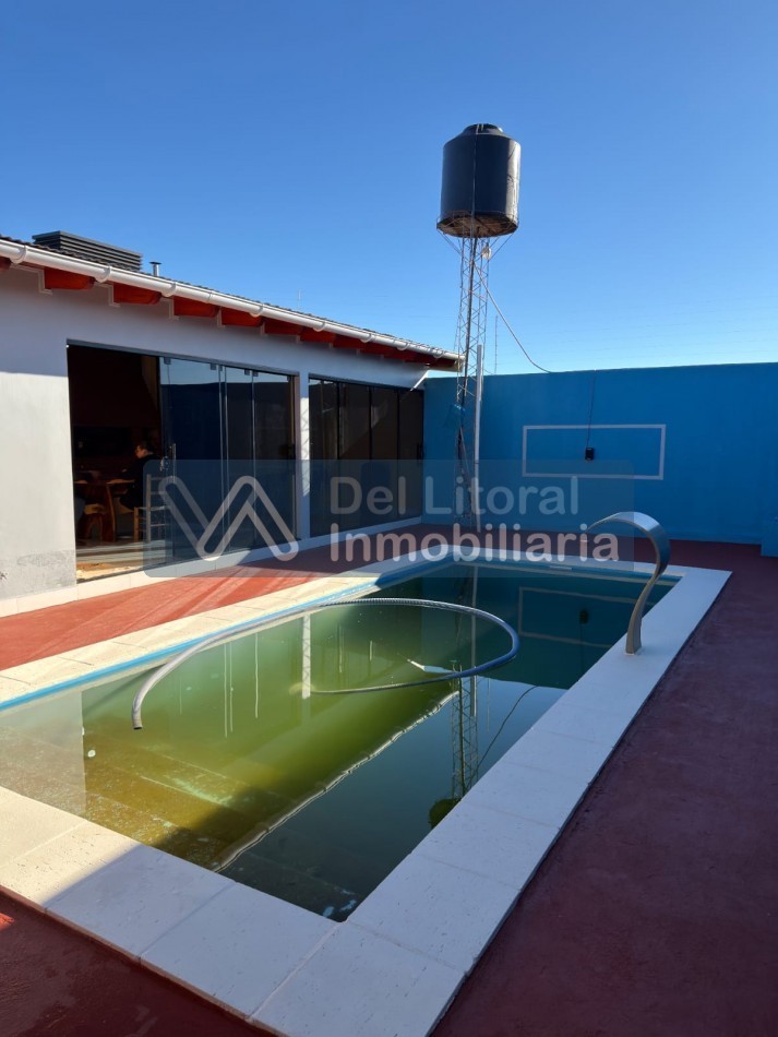 TERRENO CON CASA, QUINCHO Y PILETA