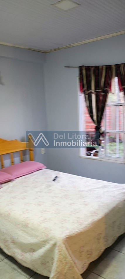 TERRENO CON CASA PROPIEDAD