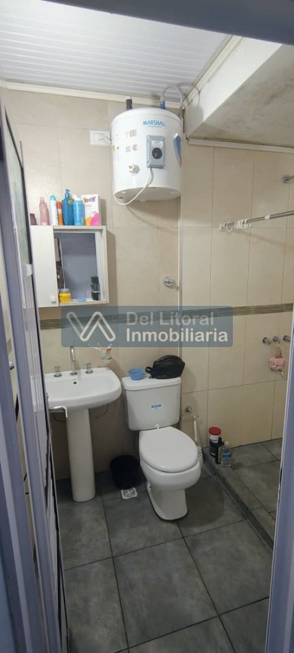 TERRENO CON CASA PROPIEDAD
