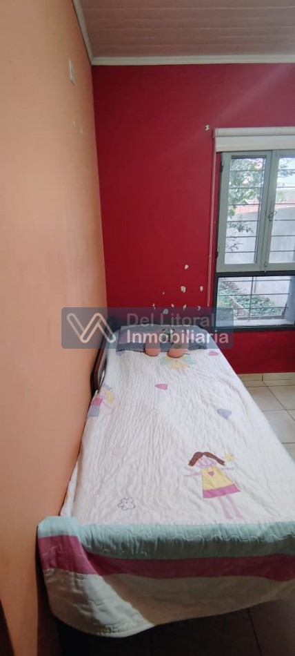 TERRENO CON CASA PROPIEDAD