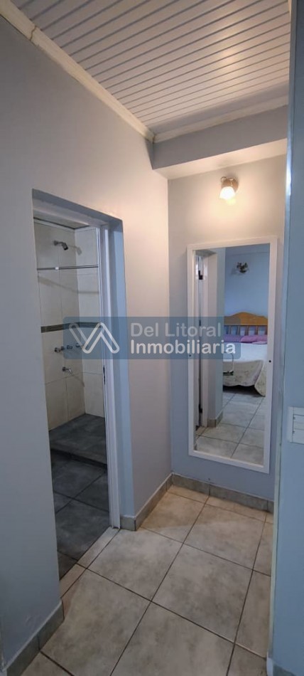TERRENO CON CASA PROPIEDAD