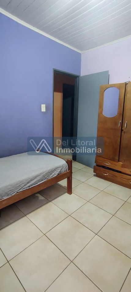 TERRENO CON CASA PROPIEDAD