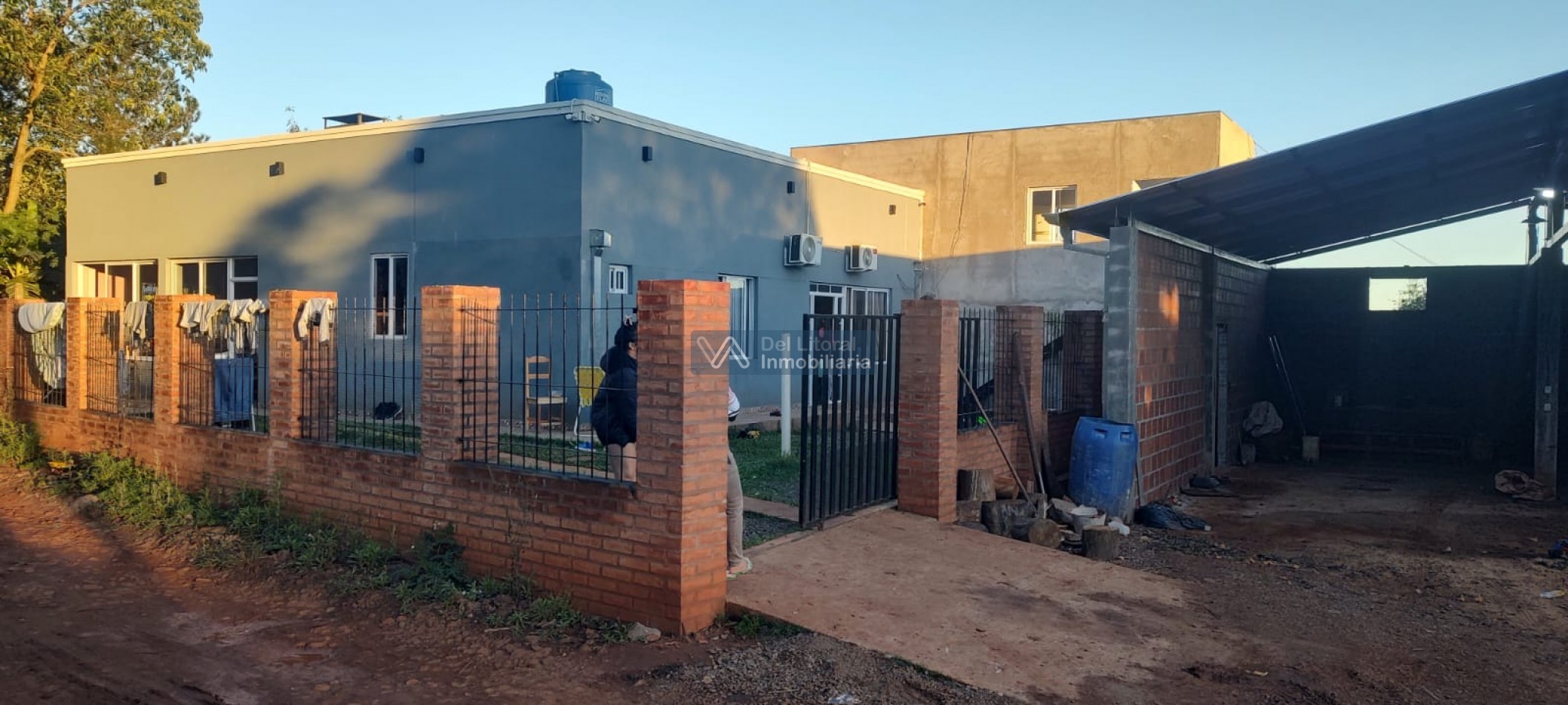 TERRENO CON CASA 