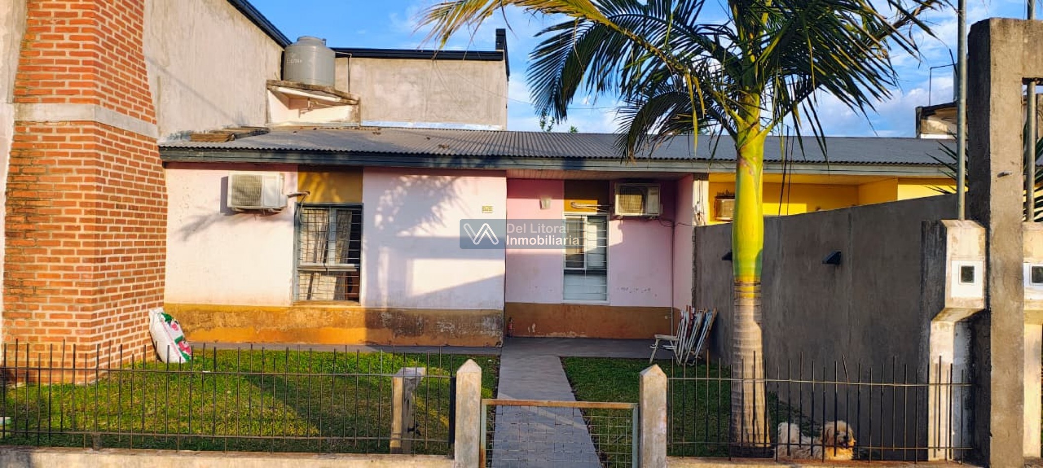 TERRENO CON CASA PROPIEDAD