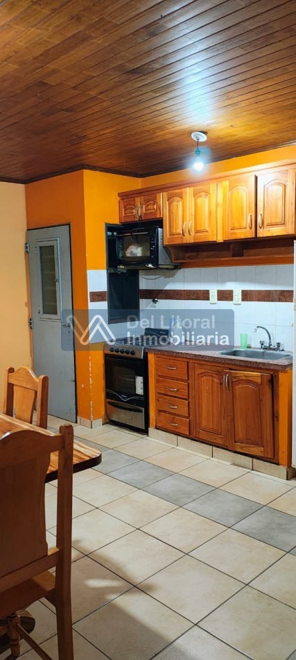 TERRENO CON CASA PROPIEDAD