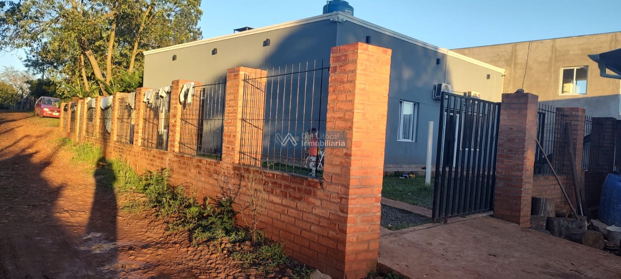 TERRENO CON CASA 