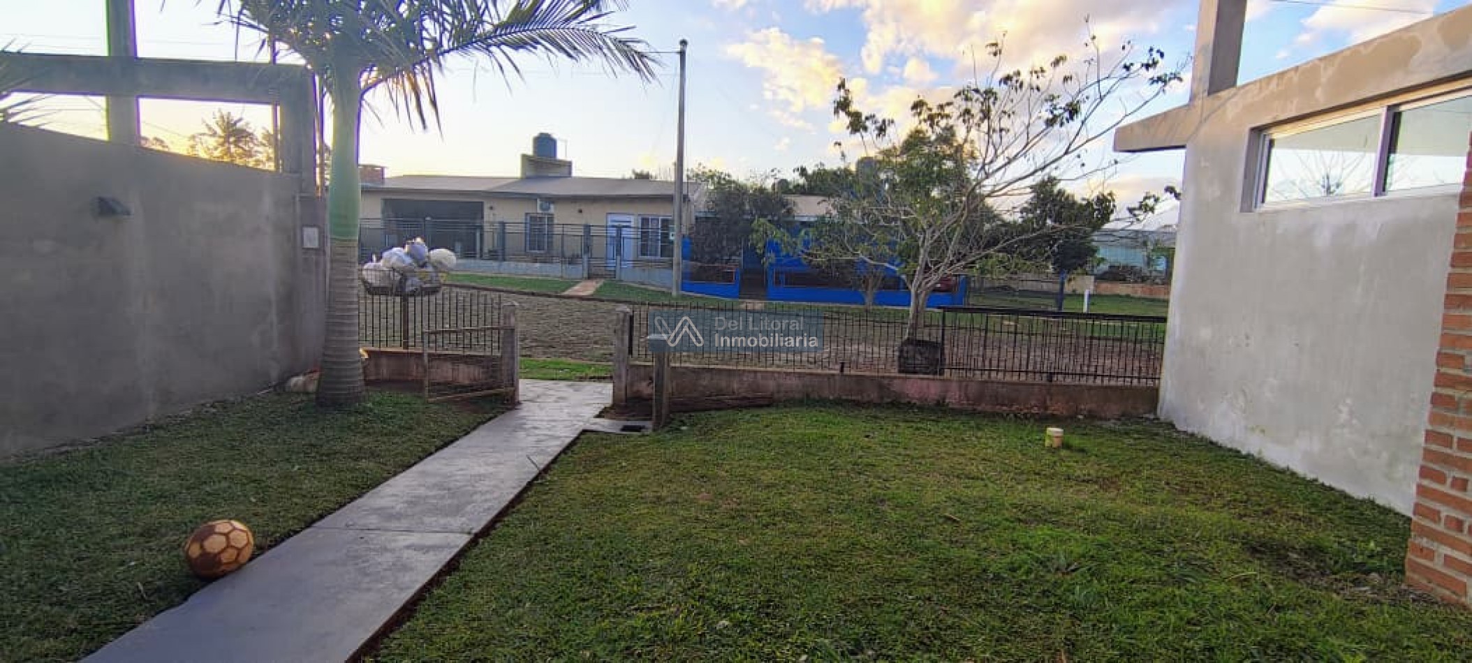 TERRENO CON CASA PROPIEDAD