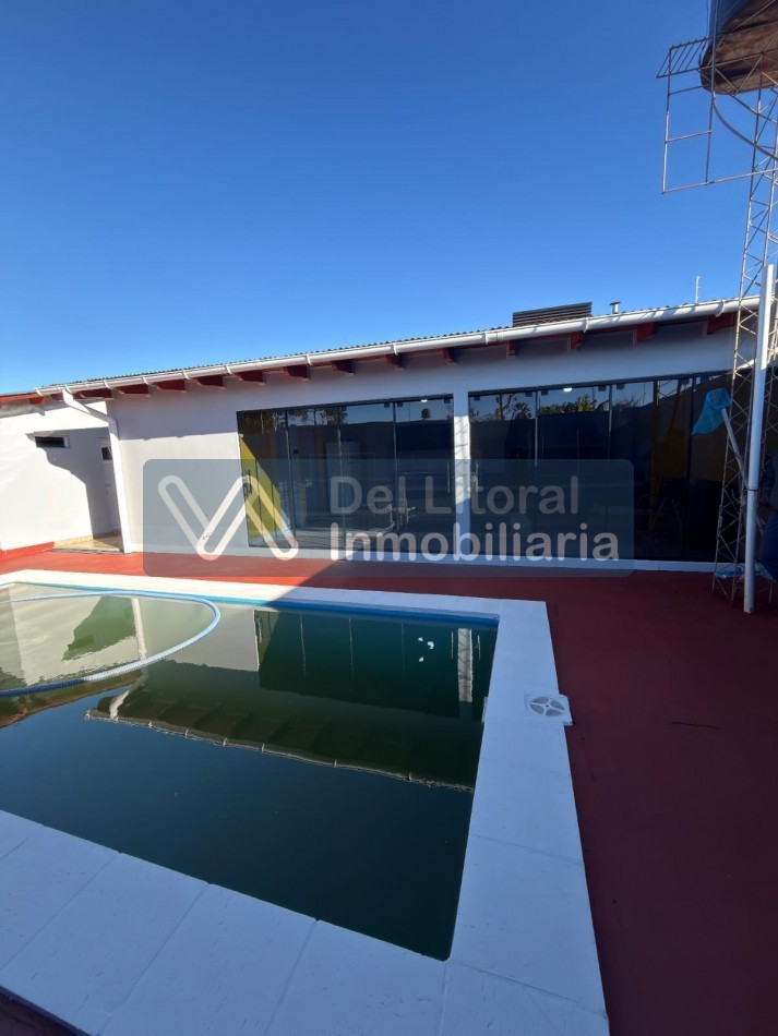 TERRENO CON CASA, QUINCHO Y PILETA