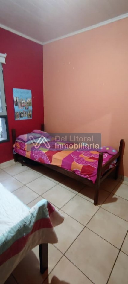 TERRENO CON CASA PROPIEDAD