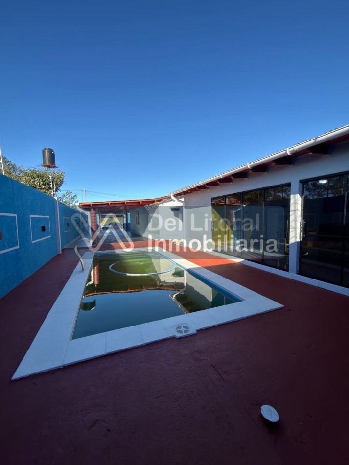 TERRENO CON CASA, QUINCHO Y PILETA