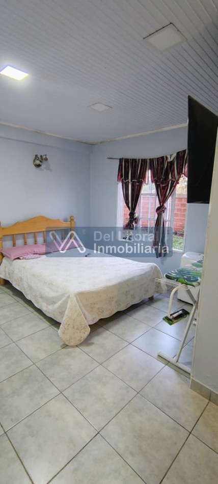 TERRENO CON CASA PROPIEDAD