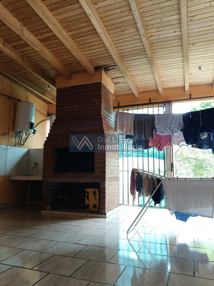 CASA CON TERRENO