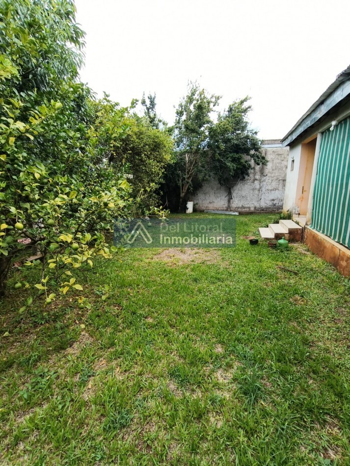 CASA CON TERRENO