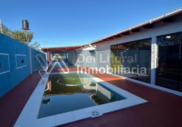 TERRENO CON CASA, QUINCHO Y PILETA